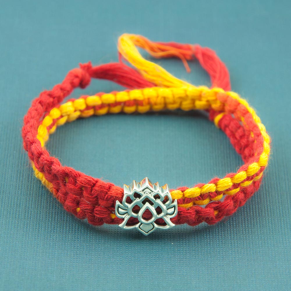 Lotus of Enlightenment Silver Story Bead with Wrap Around Moli Rakhi Bracelet