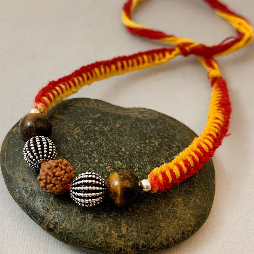 Fourseven Courage & Strength Healing Gemstone Rakhi with Tiger's Eye, Silver and Rudraksha B-0311-SP-S-TIG Base-Image