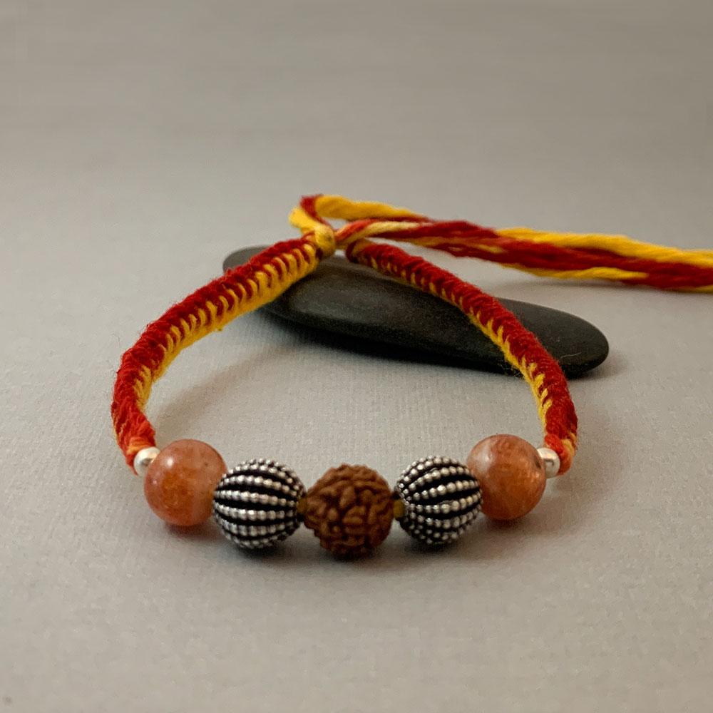 Fourseven Good Luck & Optimism Healing Gemstone Rakhi with Sunstone, Silver and Rudraksha B-0311-SP-S-SUNS Base-Image