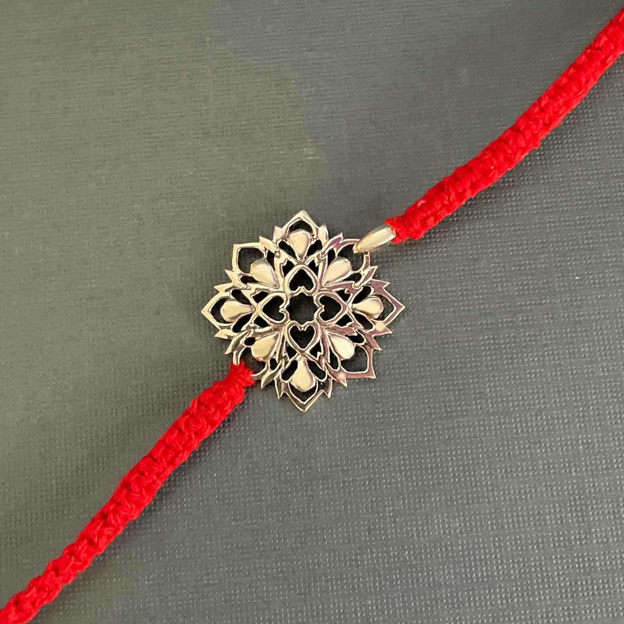 Four Elements Silver Pendant with Wrap Around Moli Rakhi Bracelet