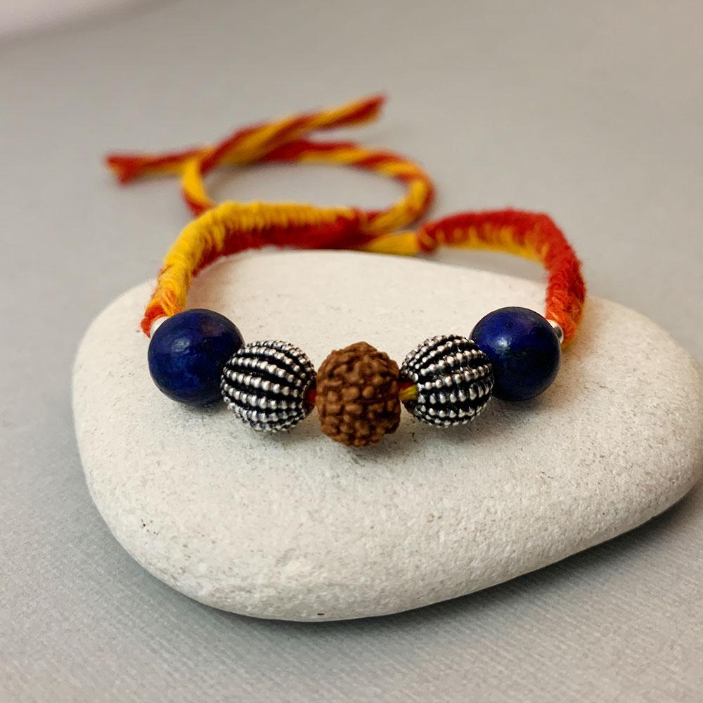 Fourseven Wisdom & Focus Healing Gemstone Rakhi with Lapis Lazuli, Silver and Rudraksha B-0311-SP-S-LAPL Base-Image