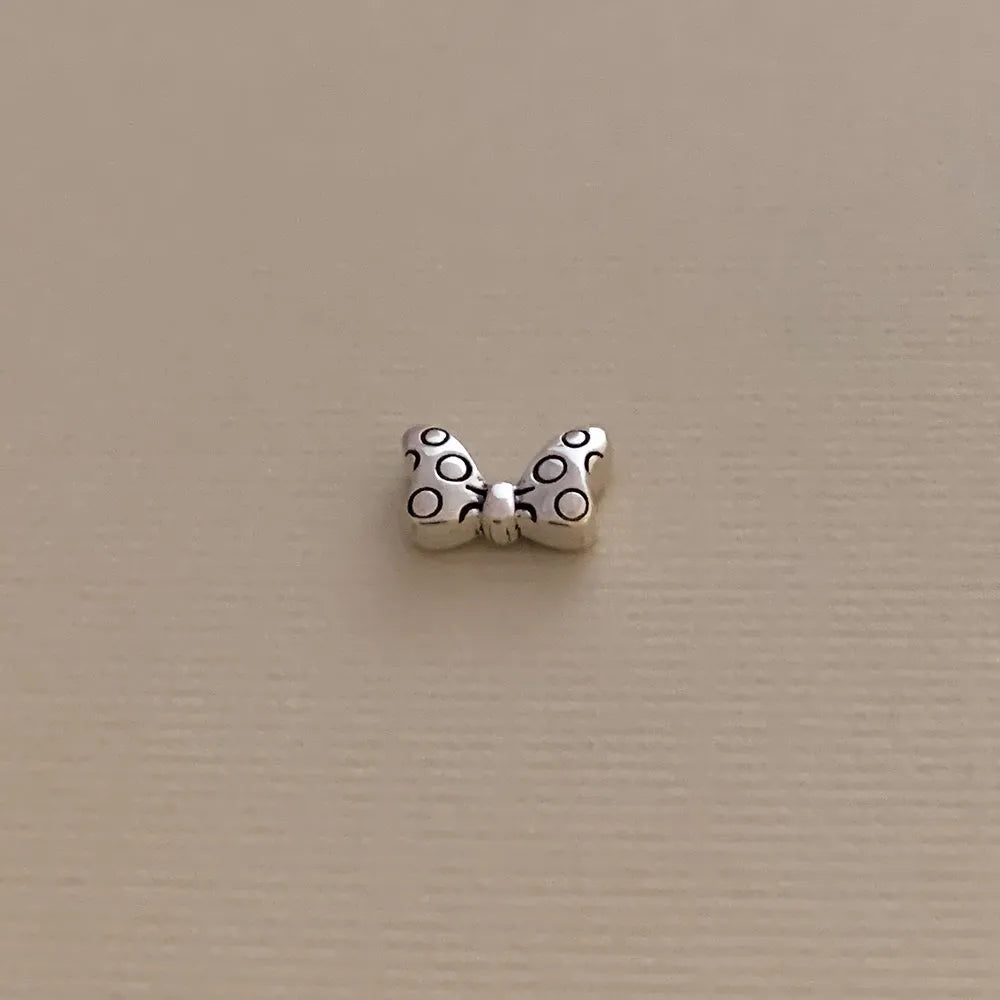 Iconic Bow Silver Stud