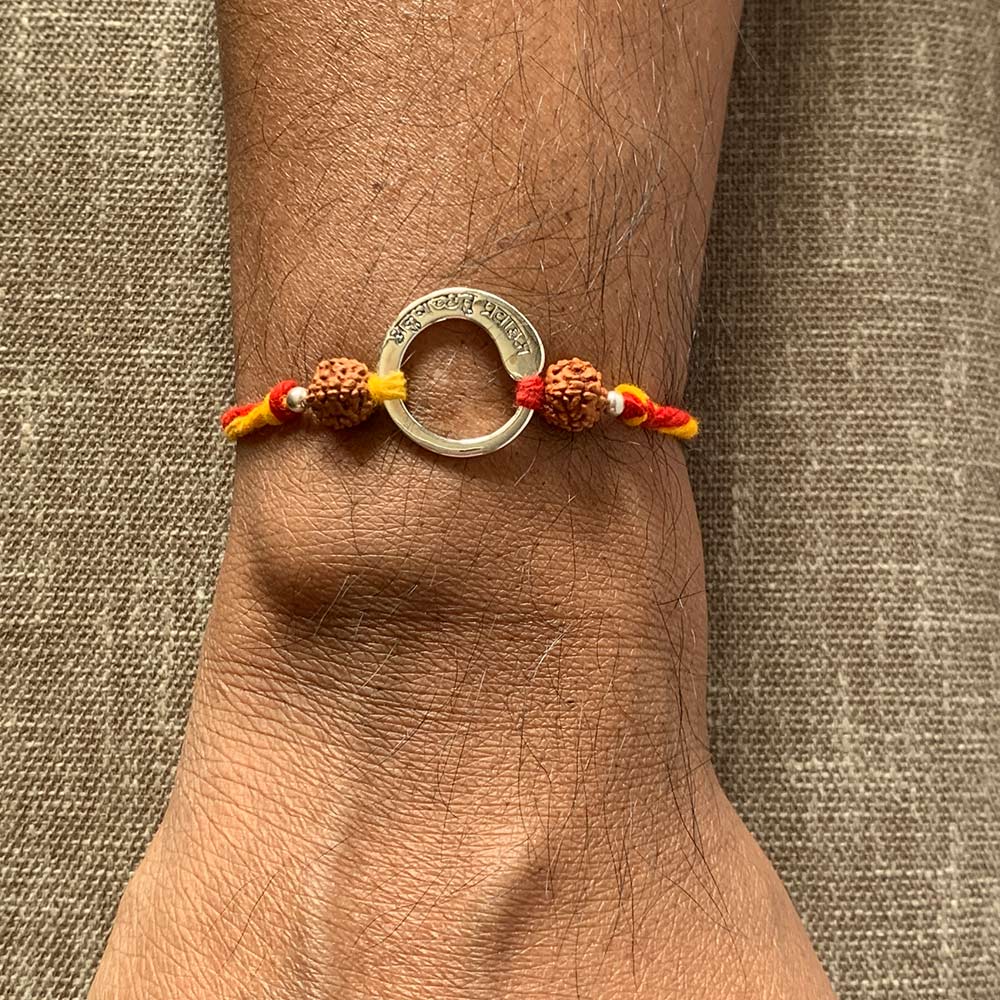 Anugachchhatu Pravaaham Enso Silver Pendant Moli Rakhi Bracelet