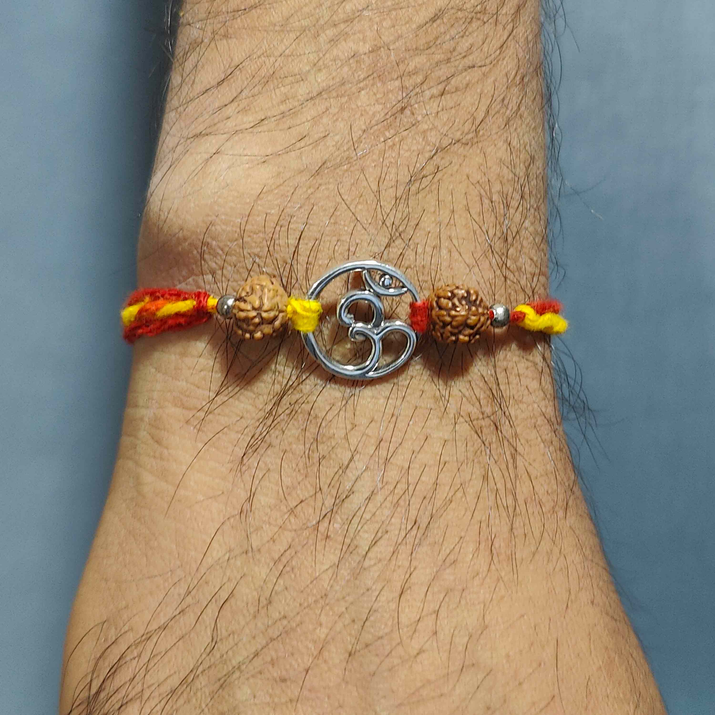 Eternal Om Silver Pendant Moli Rakhi