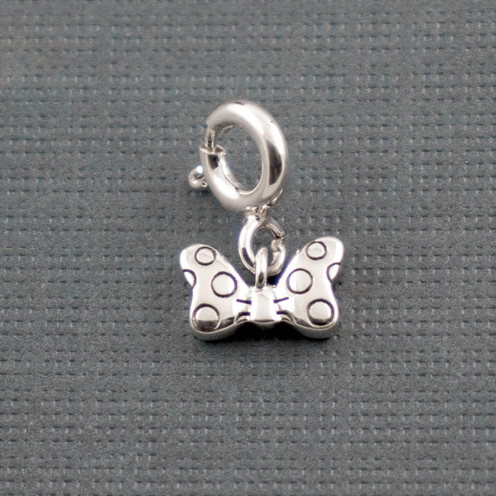 Textured Iconic Bow Silver Charm