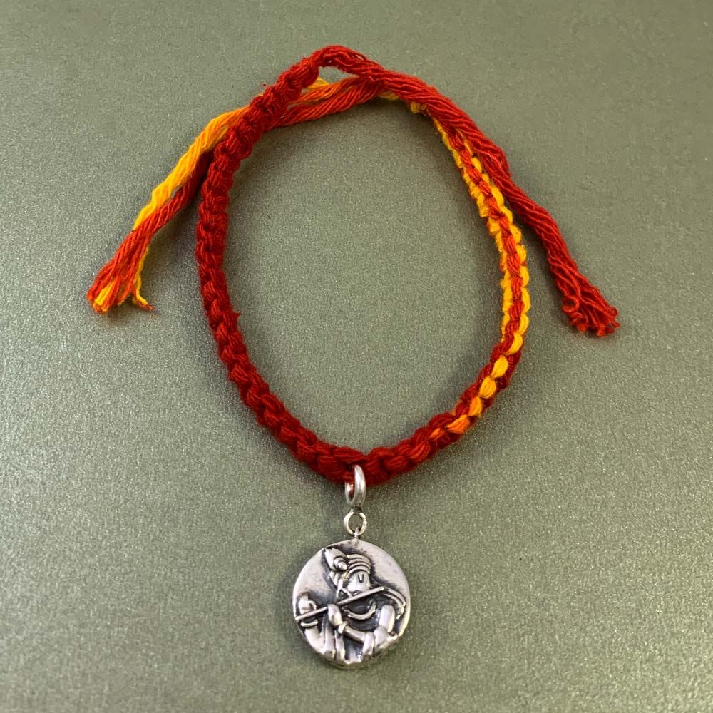 Radha Krishna Aashirwaad Silver Charm Moli Rakhi Bracelet