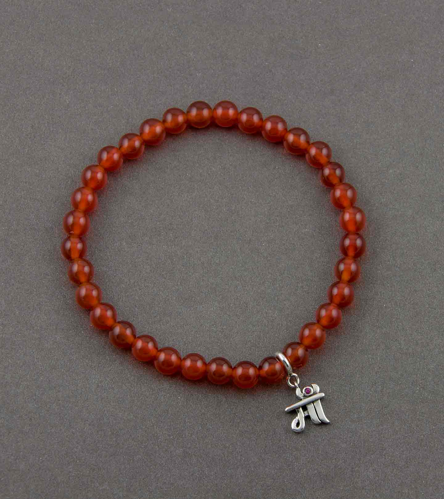 Maa Silver Charm with Red Onyx Elastic Bead Bracelet