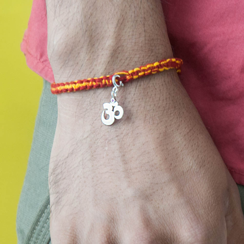 Om Silver Charm Moli Rakhi Bracelet