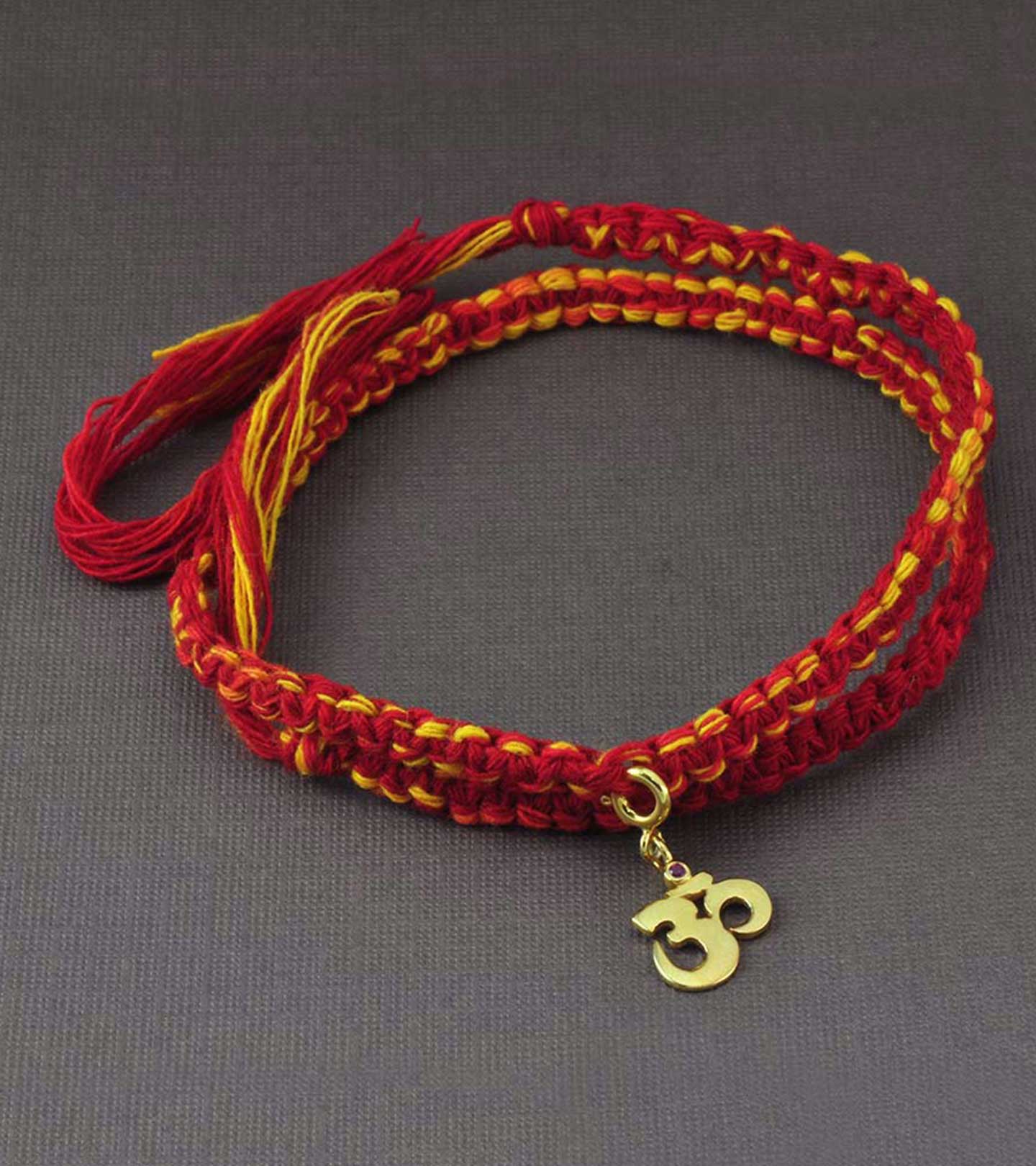 Om Gold-Plated Silver Charm Moli Rakhi Bracelet