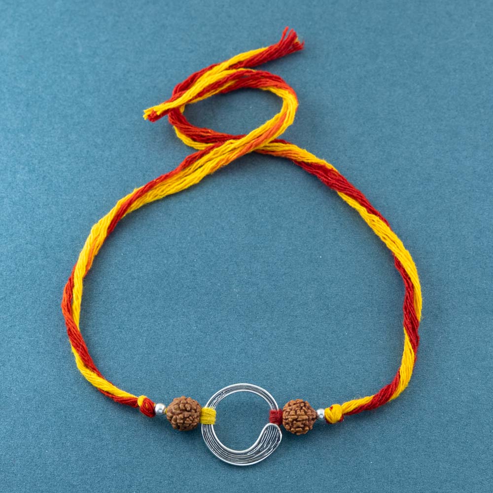 Anugachchhatu Pravaaham Enso Silver Pendant Moli Rakhi Bracelet