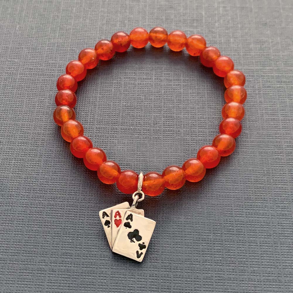 Teen Patti Silver Charm on Red Onyx Elastic Bead Bracelet