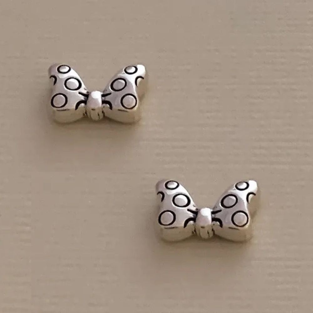 Playful Bows Silver Stud Earrings